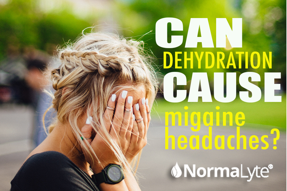 Can dehydration cause migraine headaches? | NormaLyte ORS oral rehydration salt electrolyte powder.  Blonde young woman with her face in her hands wearing a heart monitoring watch