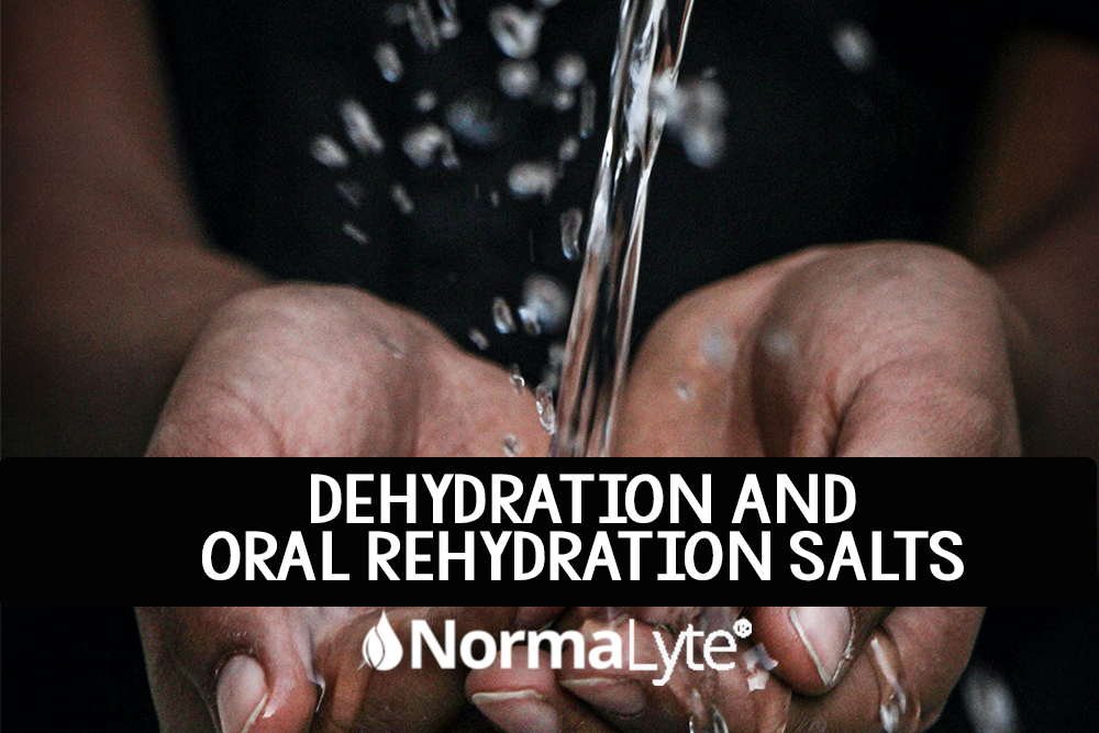 Image is a black background with hands collecting water.  Caption reads "Dehydration and oral rehydration salts" with the NormaLyte logo at the bottom.