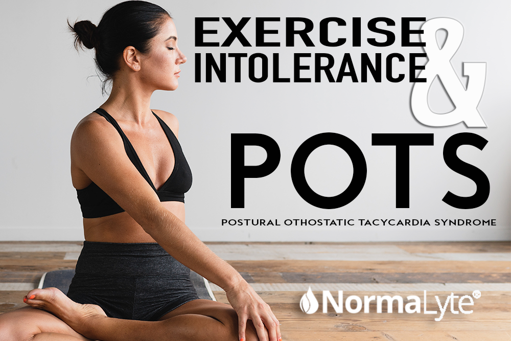 Exercise intolerance and POTS, postural orthostatic tachycardia syndrome. Woman with POTS sitting on a yoga mat with body slightly turned in pose. She's wearing a black sports bra and compression yoga pants