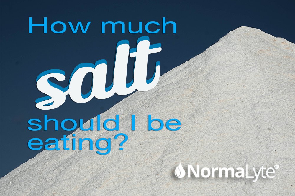 How Much Salt Should I Be Eating? NormaLyte white logo and mountain of salt against a blue background | NormaLyte ORS Oral Rehydration Salt Electrolyte Powder