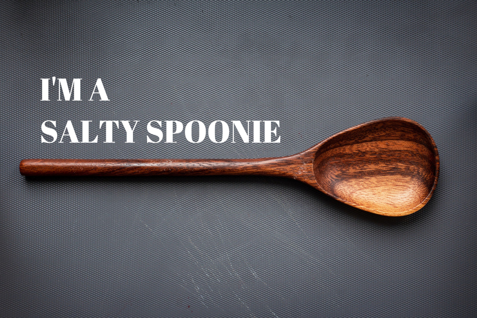 Image shows a wooden hand carved spoon.  Text reads "I'm a Salty Spoonie".  NormaLyte Oral Rehydrations Solution with electrolytes