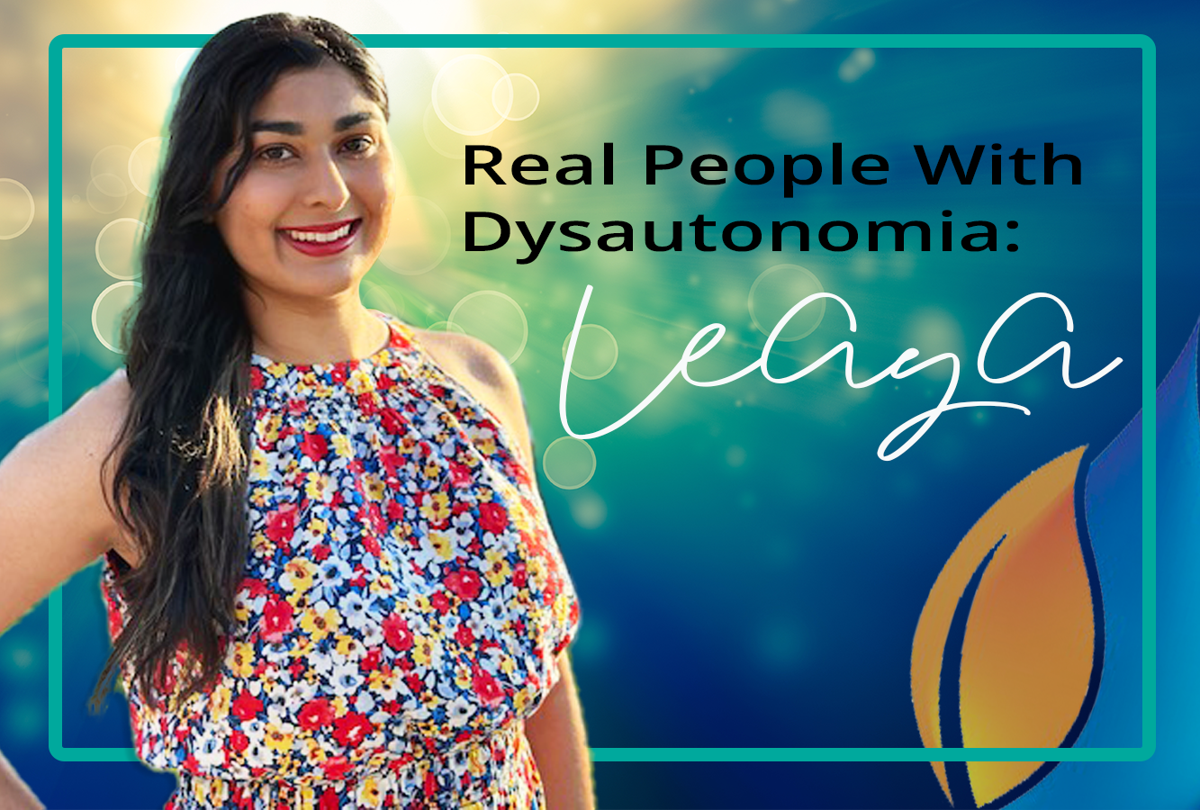 Real People With Dysautonomia: Leaya, an indian woman with POTS wearing a floral print, dark long hair