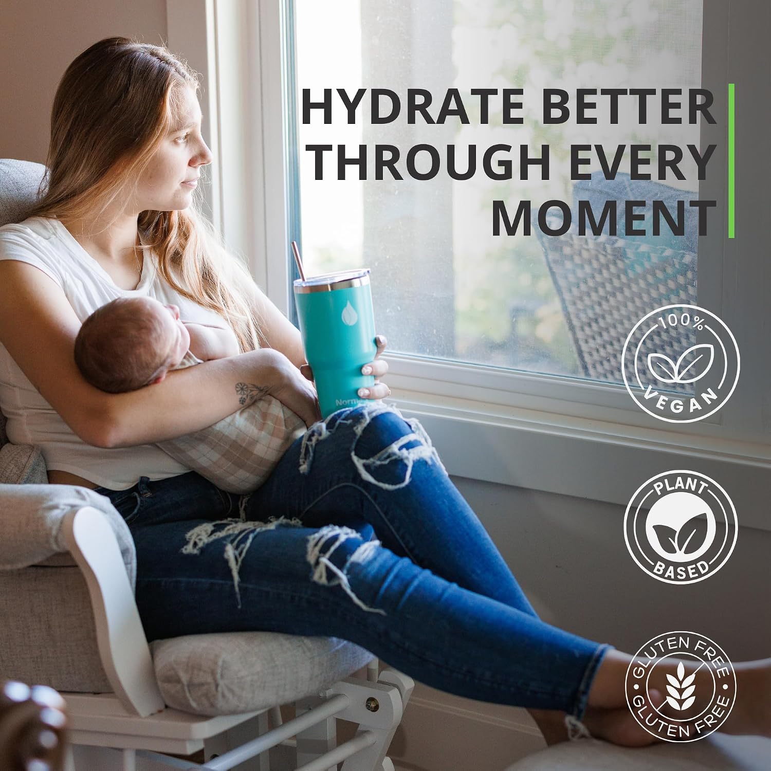 A woman in a white tank top and ripped blue jeans sits in a chair by a window, holding a baby and a teal tumbler. Large text reads 'HYDRATE BETTER THROUGH EVERY MOMENT' with circular badges on the right saying '100% Vegan', 'Plant Based', and 'Gluten Free'.