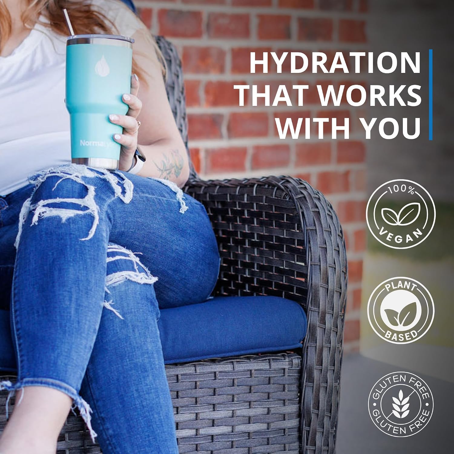 Person sitting on a chair holding a blue tumbler with text about hydration and product features.
